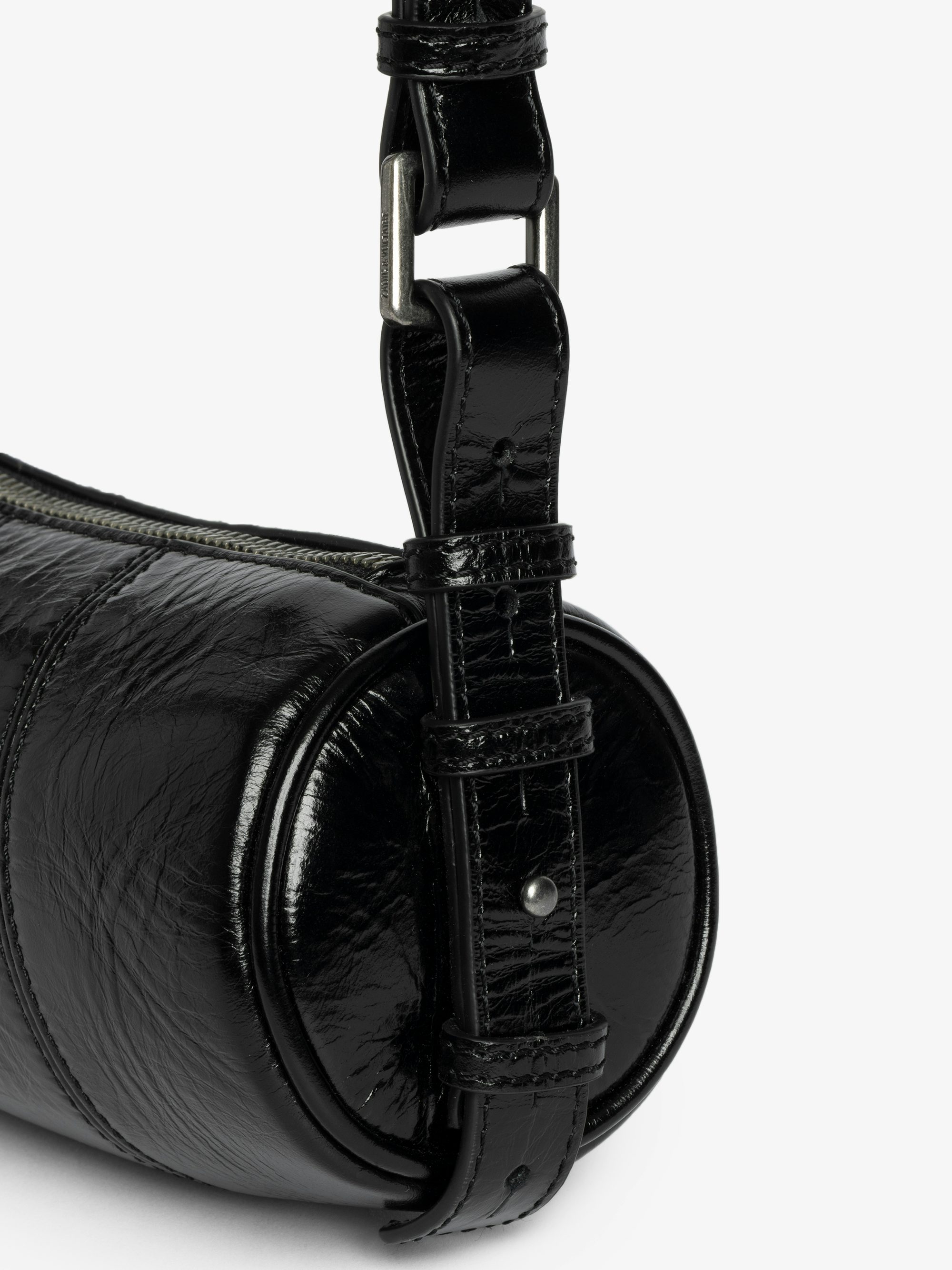 Le Roudoudou Vintage Patent Bag - Patent leather bag with vintage-inspired effect, adjustable shoulder strap and wings signature.